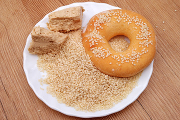 Pile sesame grains, halvah and donut