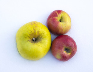 Fresh apples on the snow
