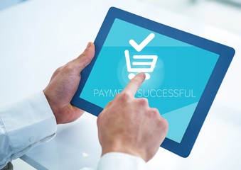 Hand of businessman doing online payment on digital tablet