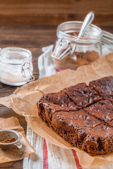 Brownie on a dark wooden background
