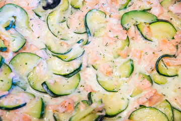 Food background with zucchini and salmon