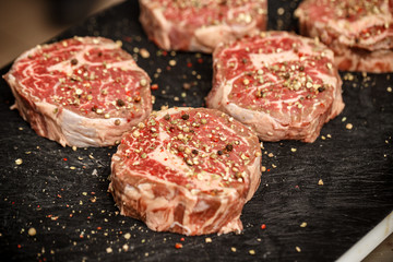 Raw meat steaks