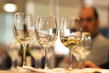 wine tasting sampling with glasses , selective focus