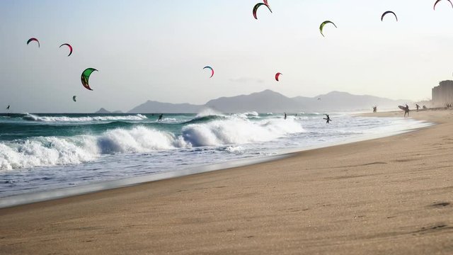 Kitesurfers on the waves near the Barra in Rio