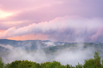 Beautiful from the nature with fog and clouds at sunset