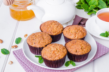 Muffins with pumpkin, walnuts, dark chocolate and wheat bran