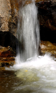 Photo of a beautiful small waterfall