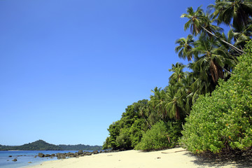 Obraz premium Tropical Beach of Coibita, aka Rancheria, with Isla Coiba in the Background. Coiba National Park, Panama