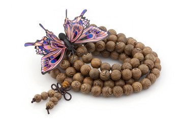 Bracelet made of wooden beads with butterfly