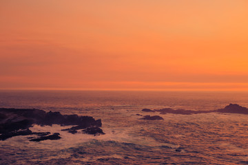 Naklejka premium Sunset on the California Coastline Ocean