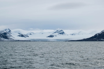 Fototapeta na wymiar Glacier meeting the ocean at Svalbard in Norway