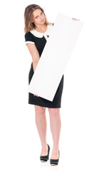 Successful business woman or teacher with white blank, isolated on white background. Happy caucasian lady holding empty banner. Businesswoman holding a white poster in full length.