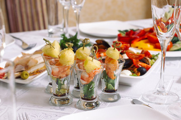 Different kind of canapes at the banquet dessert table