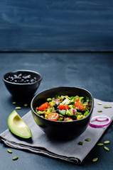 Black beans corn avocado red onion tomato salad with lime dressing