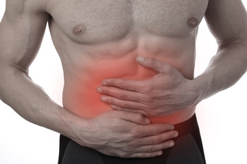 Naklejka premium Man with stomach pain. Digestive system, Urinary Tract Infection problems.