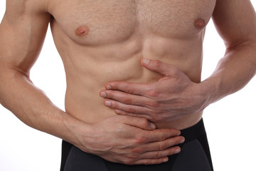 Obraz premium Man with stomach pain. Digestive system, Urinary Tract Infection problems.