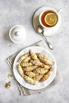 Cinnamon cookies and cup of tea for a breakfast.Top view.