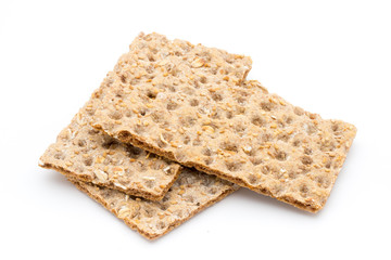 Stack of wholegrain crispy bread with sunflower, chia and sesames seeds