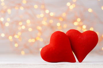 Fototapeta premium Red hearts the bokeh background. Valentine Day background.