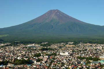 A view over Mount Fuji and Fujiyoshida city in summer, Yamanashi prefecture, Japan