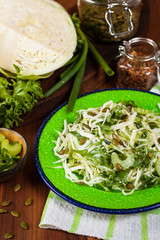 Cabbage Coleslaw Salad with Pumpkin Seeds. Selective focus.