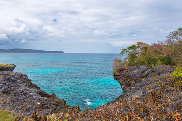 Blue caribbean sea and cliffs in Samana, Dominican Republic. Seascape backround wallpaper.