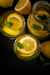 Lemonade Drink on Black Background. Selective focus.
