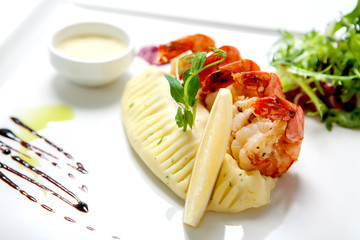 Seafood - Fried shrimps on a white plate