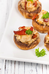 Bacon Stuffed Mushrooms with Breadcrumbs and Cheese. Selective focus.