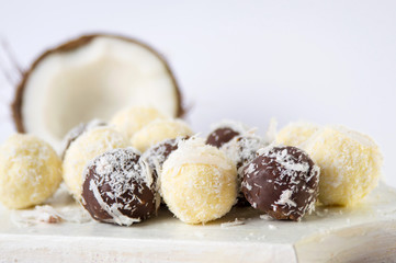 Coconut candy on a wooden tray