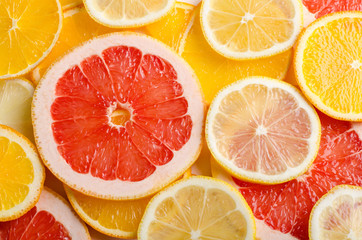 Fototapeta premium Citrus fruit slices of lemon, orange, grapefruit for background.