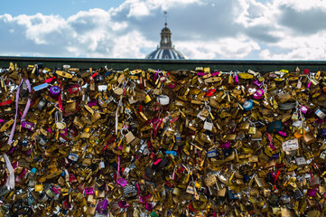 Love Padlocks Attached to a Bridge Along the Seine River in Paris, France