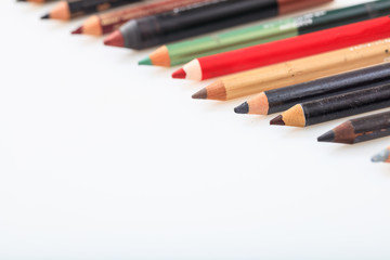 Fototapeta premium Makeup pencils set isolated on white background