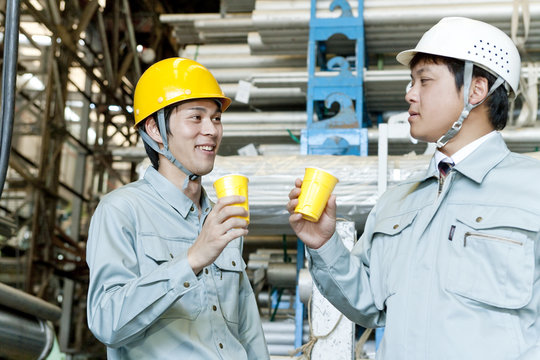 Warehouse Workers Having Coffee Break