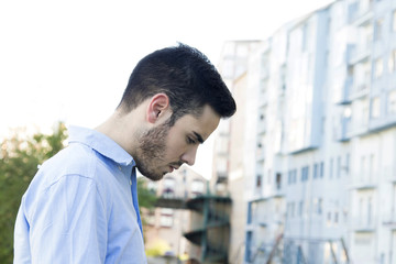 portrait of a young man in the city