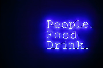 Beautiful, blue Neon Light Sign with a Title: 