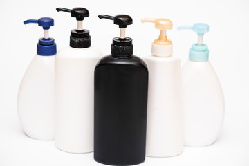 Bottles of cosmetics collection on white background