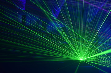 People watching laser show