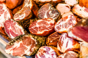 Selection of traditional Italian cured meats and sausages, selective focus