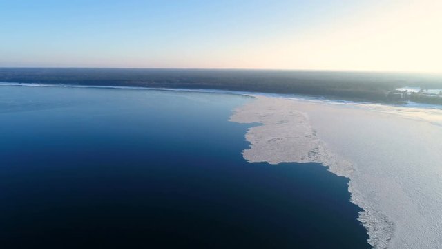 13047_Aerial_view_of_the_ocean_freezing_from_the_winter_season.mov