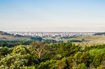 Panoramic view on the city of Tandil in Argentina from the hill. Landscape and cityscape.