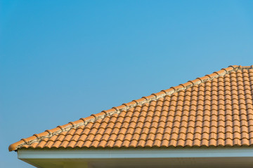 Modern tiles roof with blue sky