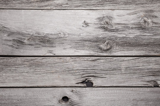 A close up of several planks of vintage barnboard.
