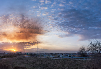 Naklejka na ściany i meble Amazing sunset colors in the sky at the outskirts of Skopje 