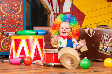 Little baby clown with red nose multi-colored wig in with balls