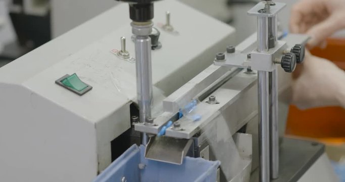 Manuall processing electronic parts for PCB.