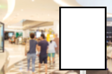Billboard for store front, Advertising poster sign and blurred people in the shopping mall  as background, for montage display, Mock up for display of product.