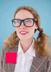 Woman with blank sticky note on her jacket
