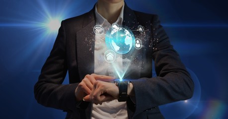Businessman using smartwatch against blue background