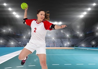 Sportswoman playing handball  - obrazy, fototapety, plakaty